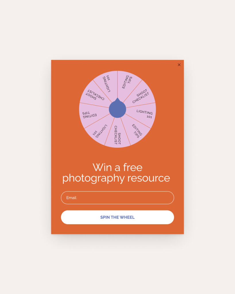 Flodesk popup form featuring a spin-to-win wheel with prizes like editing tips and shoot checklists, encouraging users to enter their email to win a free photography resource.